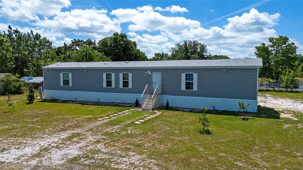 9040 Richmond Road St. Cloud, FL 34773 - Photo 1 of 1 FRONT 1