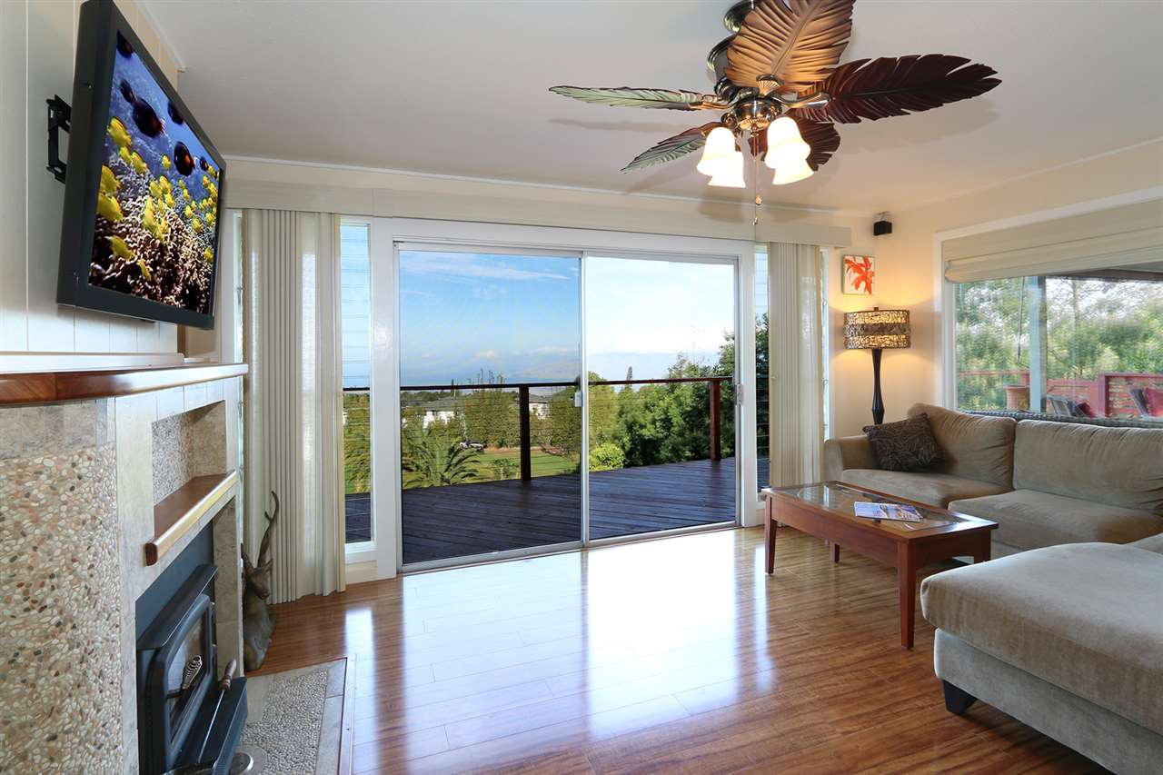 426 Ainakula Road Kula, HI 96790 - Photo 5 of 21 a living room with furniture tv and wooden floor