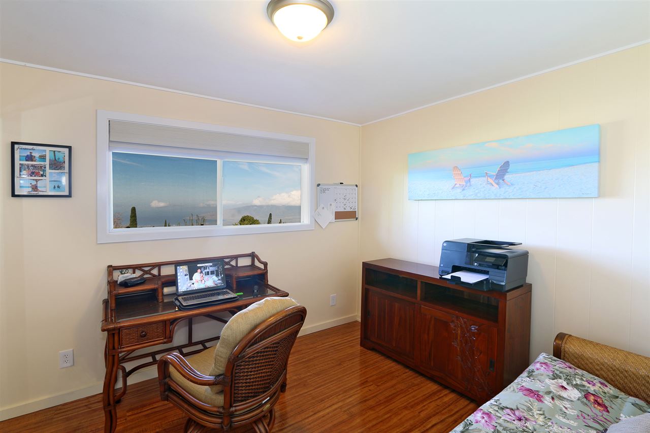 426 Ainakula Road Kula, HI 96790 - Photo 8 of 21 a living room with furniture and wooden floor