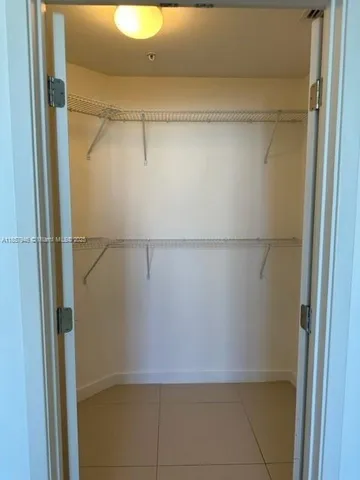 a bathroom with a sink a toilet and bathtub