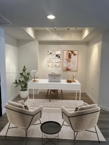 a living room with furniture and window