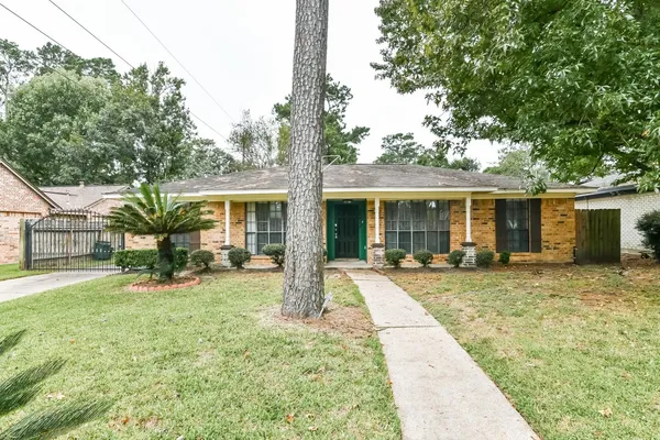 front view of a house with a patio