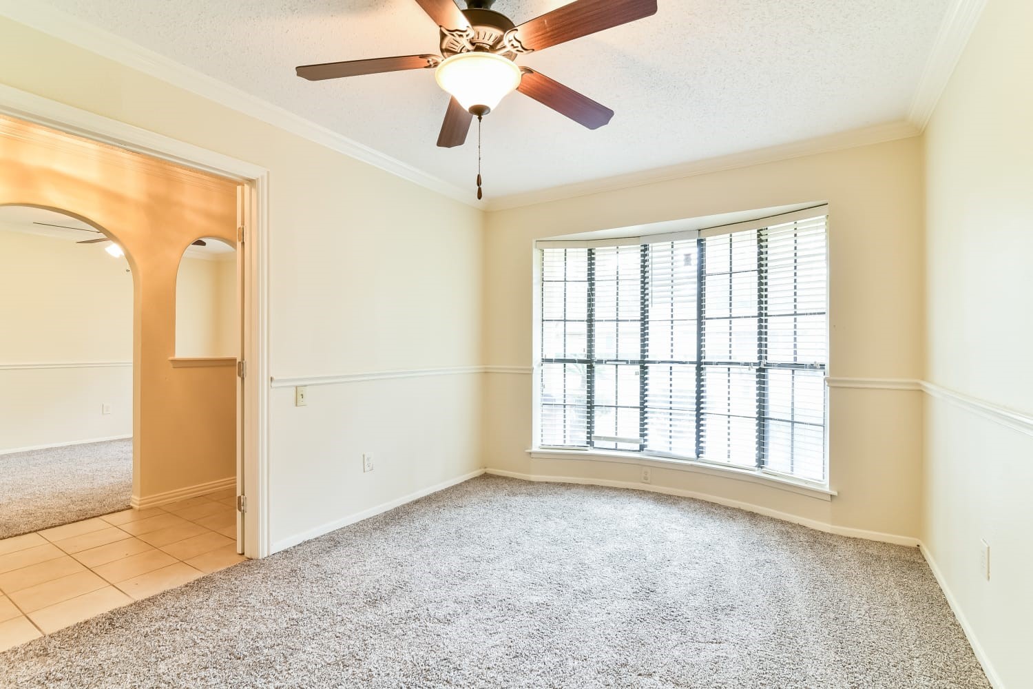 17411 Glenhew Road Humble, TX 77396 - Photo 4 of 14 a view of an empty room with a window