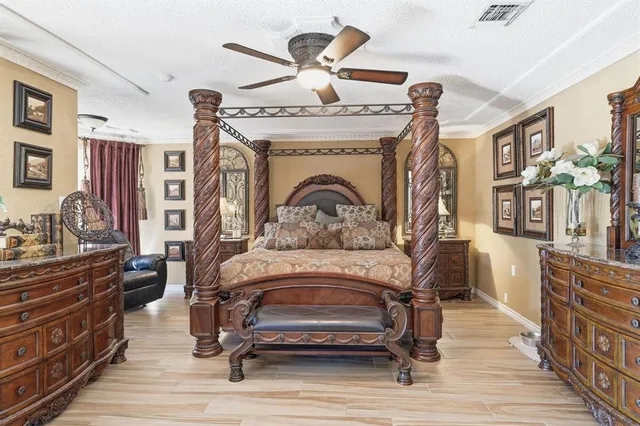 a spacious bathroom with a tub sink and mirror