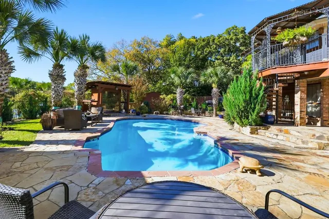 a view of outdoor space with swimming pool