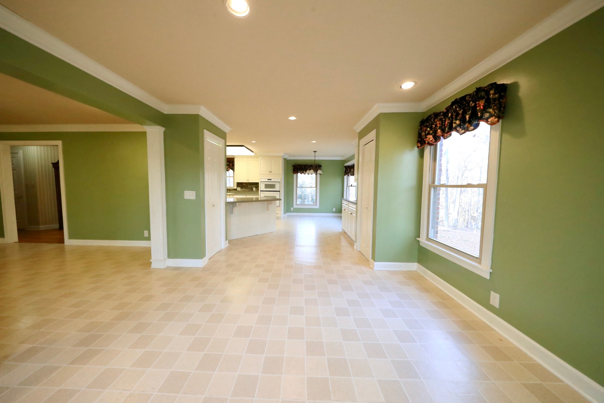 6982 New Chapel Road Springfield, TN 37172 - Photo 11 of 32 a view of hallway with a large window and kitchen view