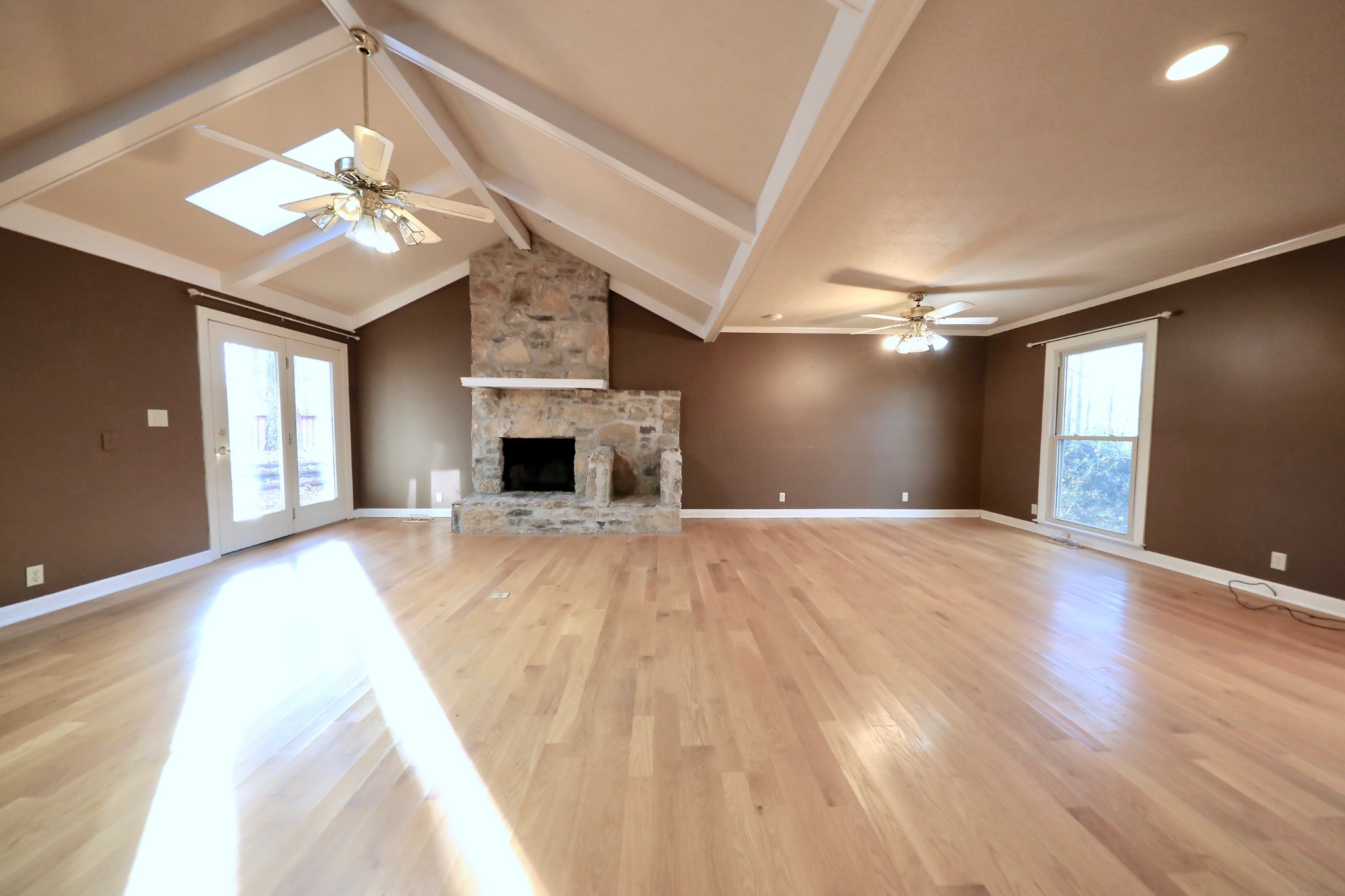 6982 New Chapel Road Springfield, TN 37172 - Photo 14 of 32 a view of an empty room with window and wooden floor