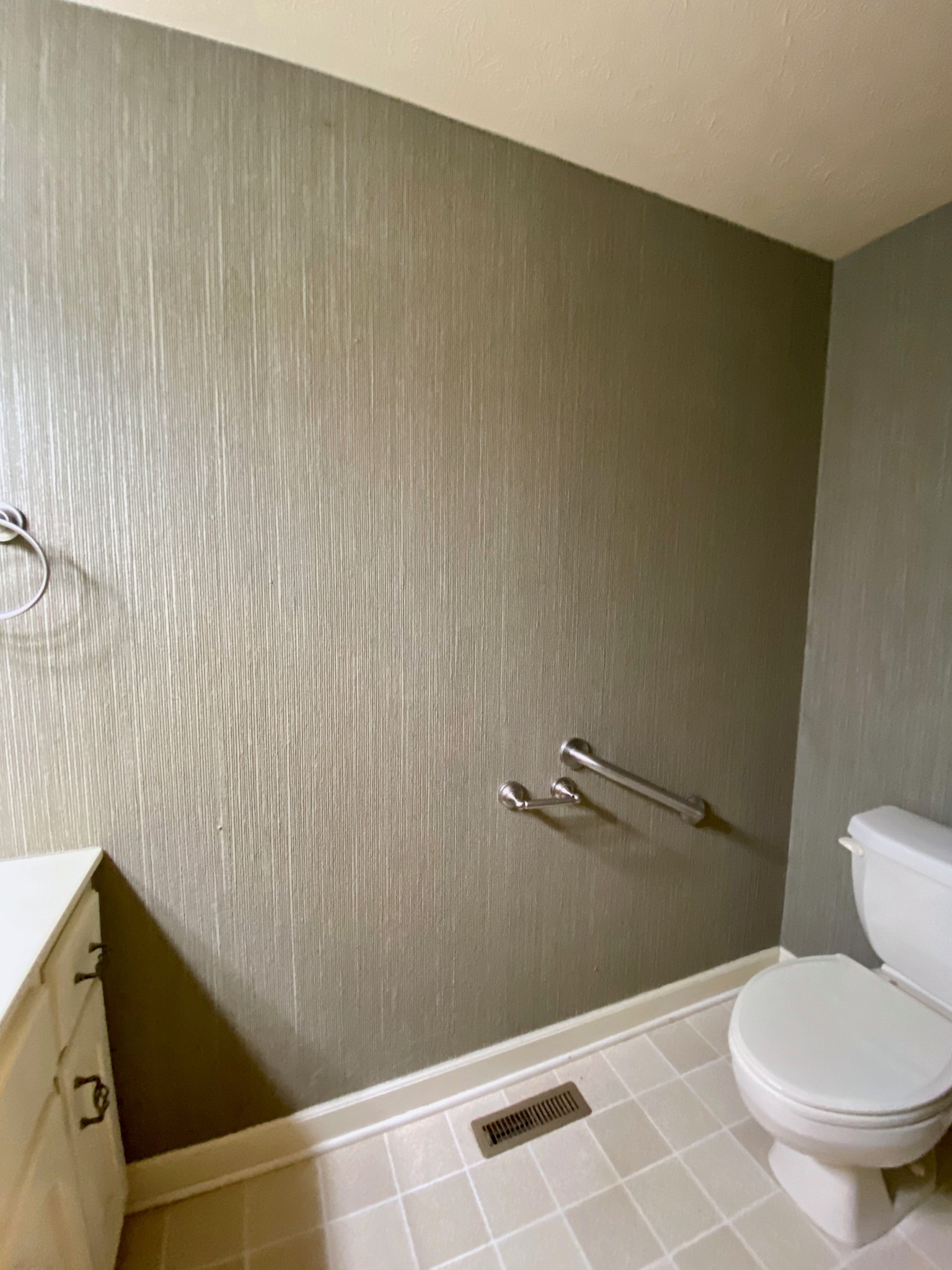 6982 New Chapel Road Springfield, TN 37172 - Photo 18 of 32 a white toilet sitting next to a shower