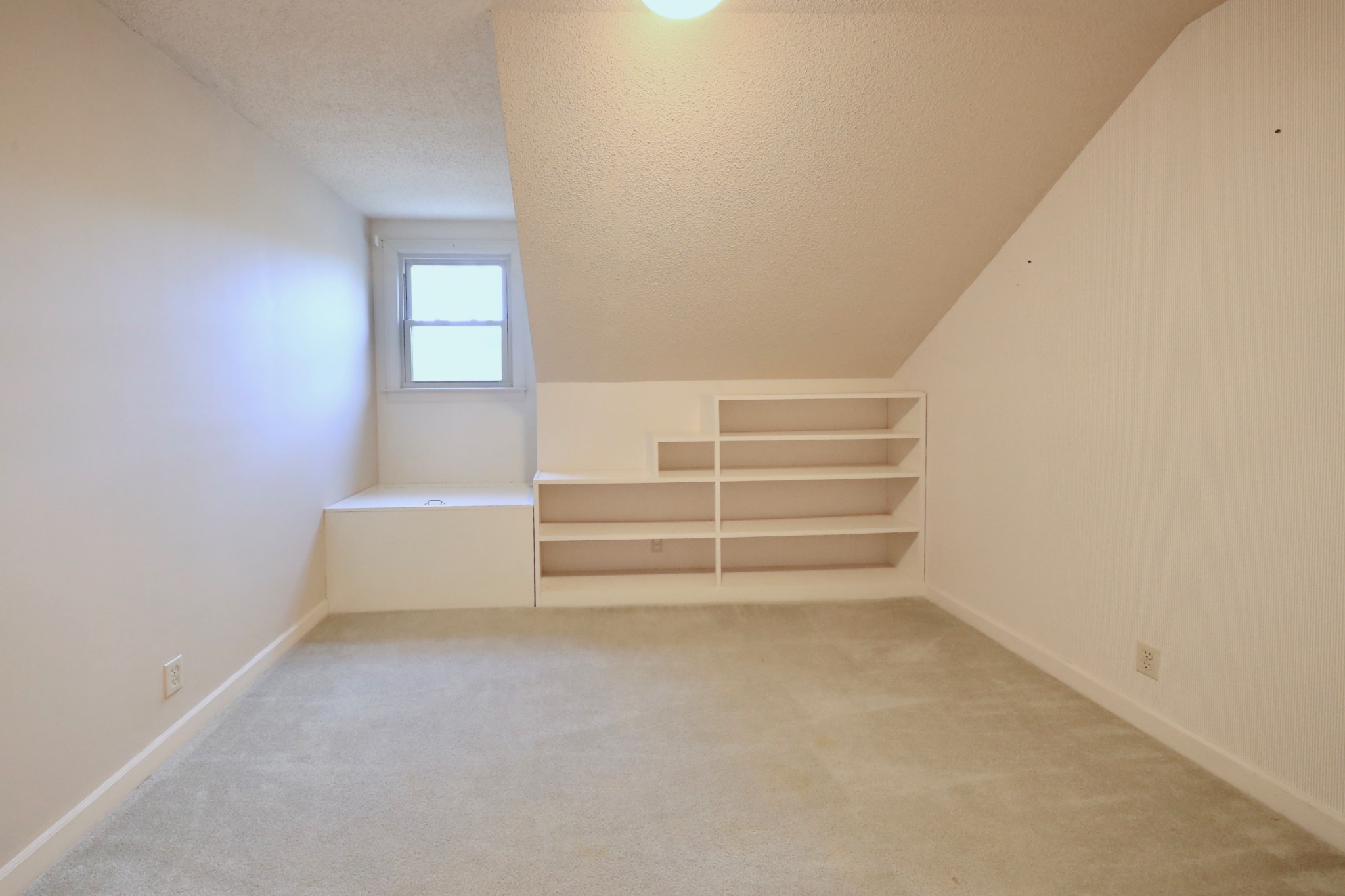 6982 New Chapel Road Springfield, TN 37172 - Photo 23 of 32 a view of walk in closet with empty racks