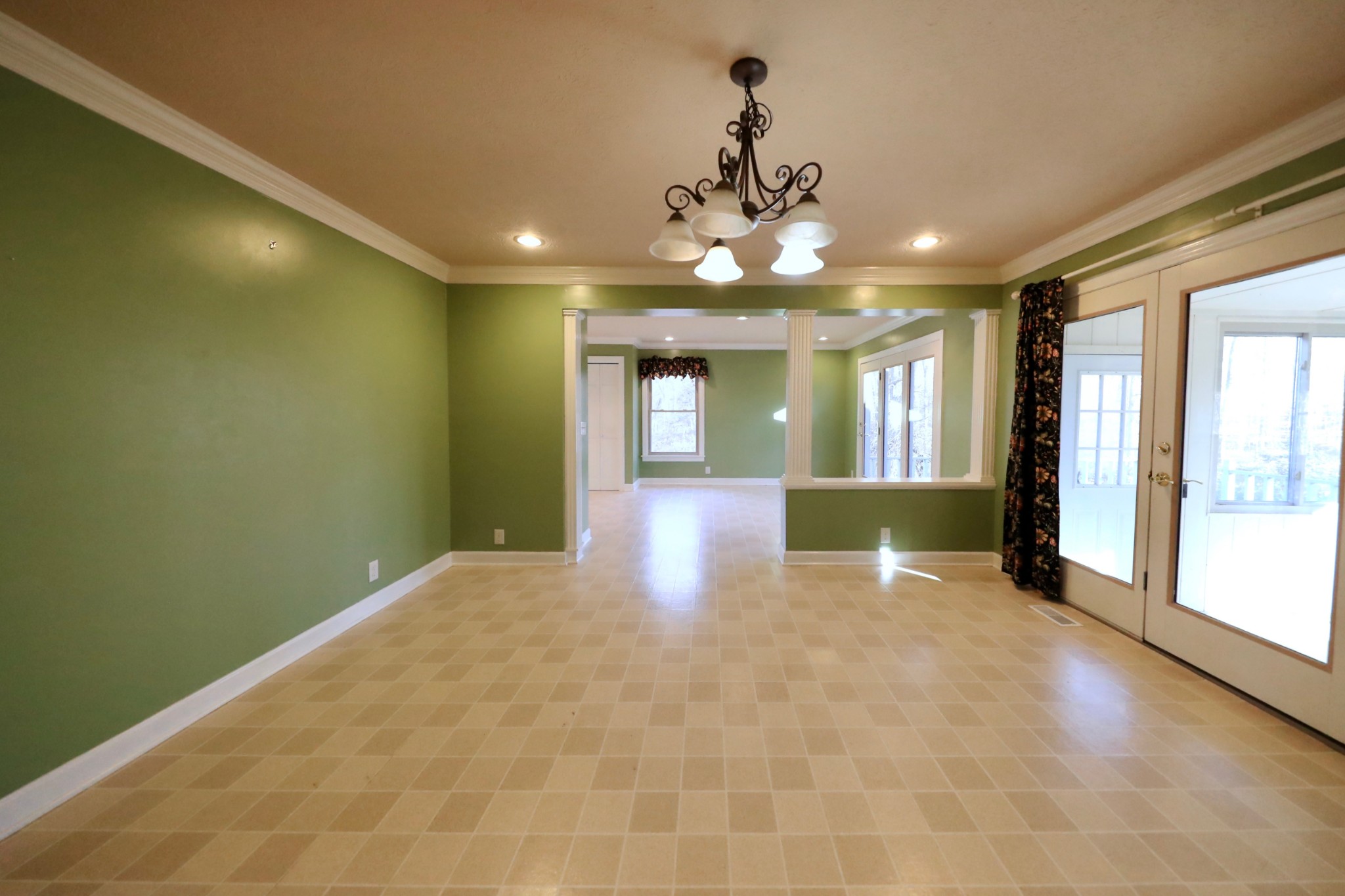 6982 New Chapel Road Springfield, TN 37172 - Photo 10 of 32 a view of an empty room with window and chandelier