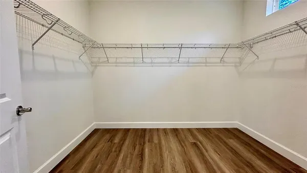 a view of a room with racks on the wall