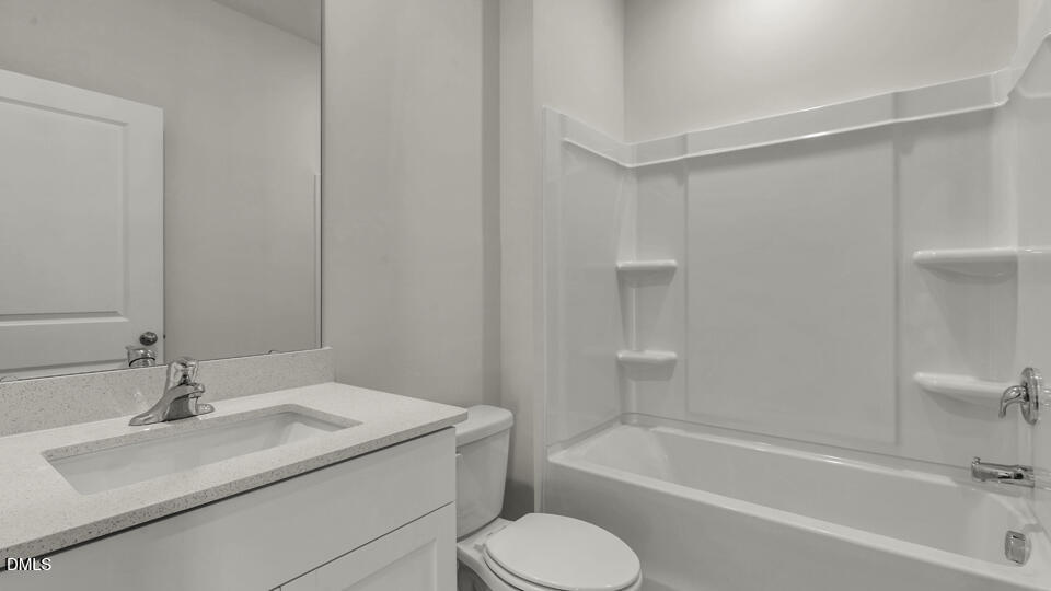 1281 Pavo Path Wendell, NC 27591 - Photo 17 of 54 a bathroom with a sink toilet and bathtub