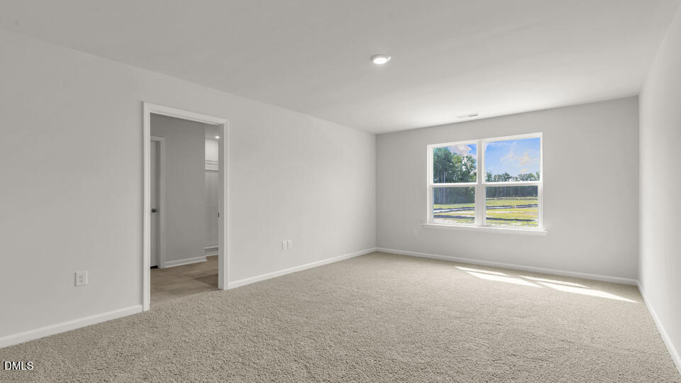 1281 Pavo Path Wendell, NC 27591 - Photo 23 of 54 a view of an empty room with a window