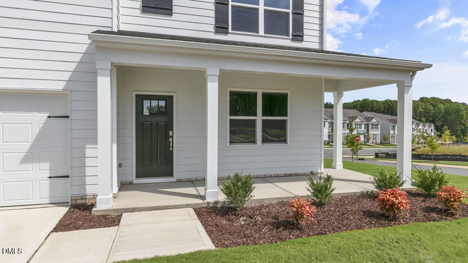 1281 Pavo Path Wendell, NC 27591 - Photo 4 of 54 a front view of a house with a yard