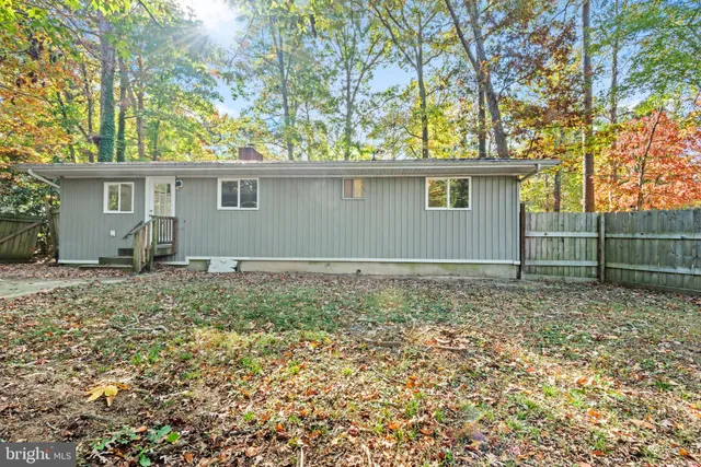 front view of a house with a dry yard
