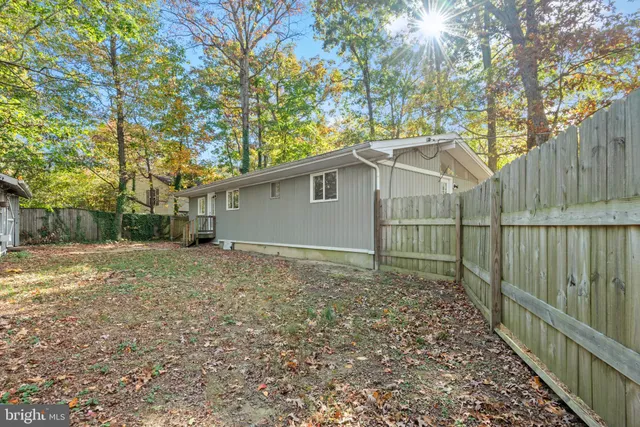 a house with trees in front of it