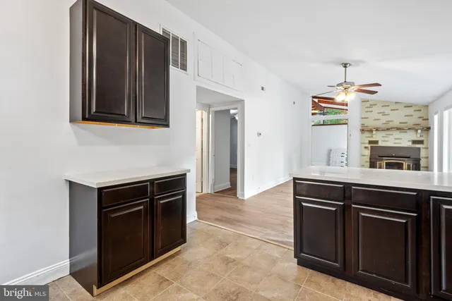 a kitchen with a stove and a sink
