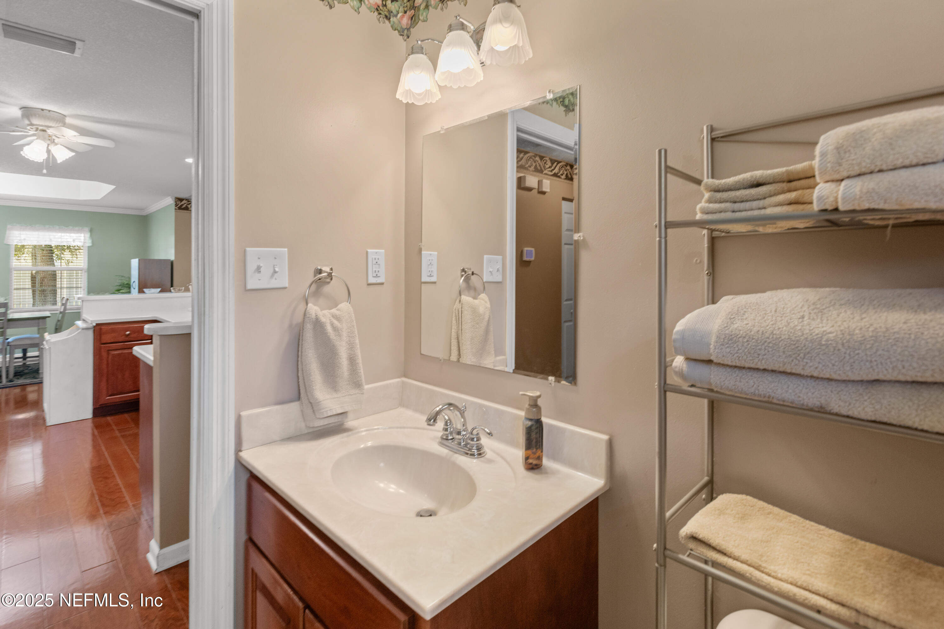 618 Southeast 44th Street Keystone Heights, FL 32656 - Photo 40 of 66 a bathroom with a sink toilet and shower