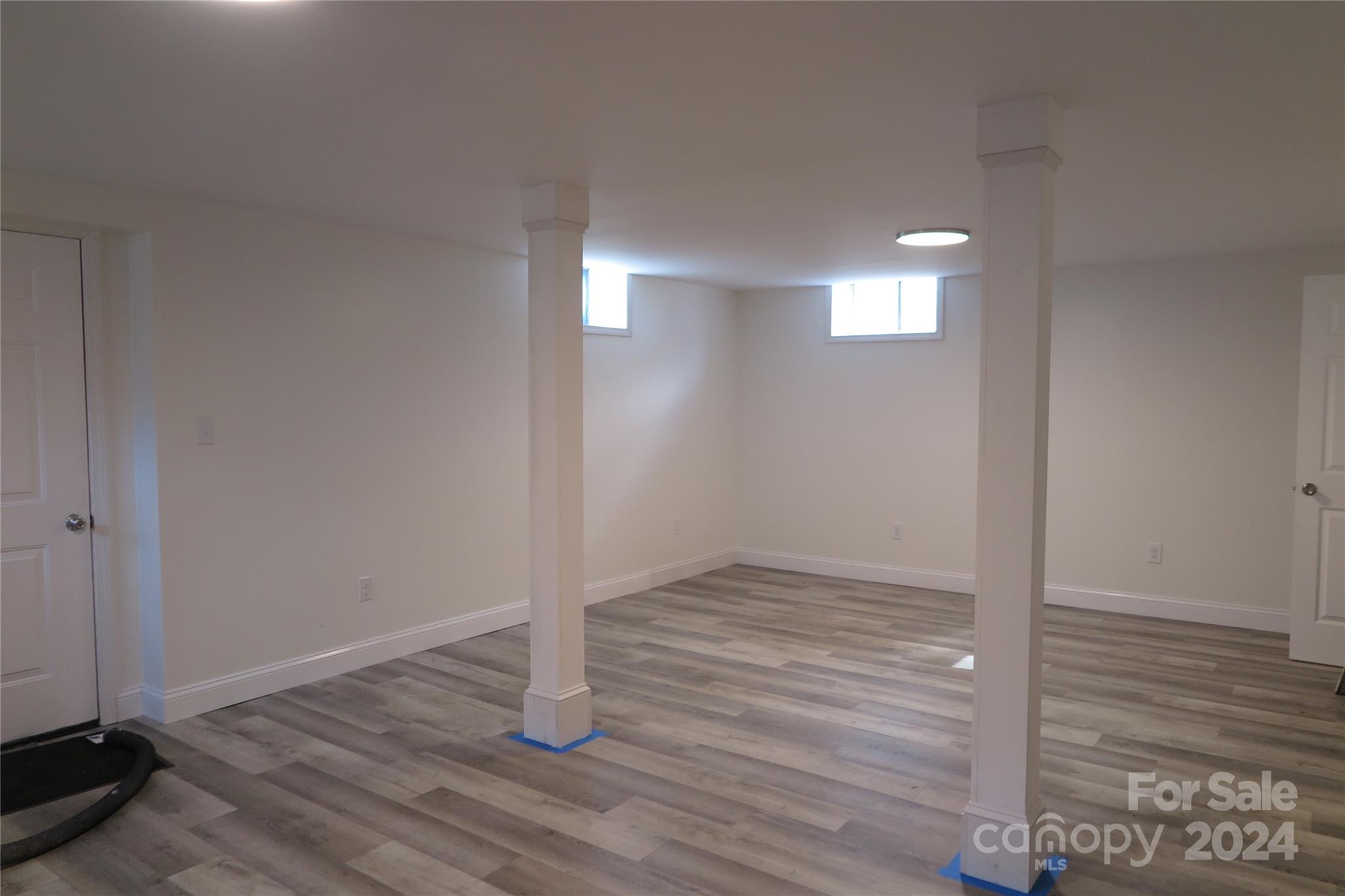 544 Loray Farm Road Dallas, NC 28034 - Photo 11 of 30 a view of wooden floor and windows in a room
