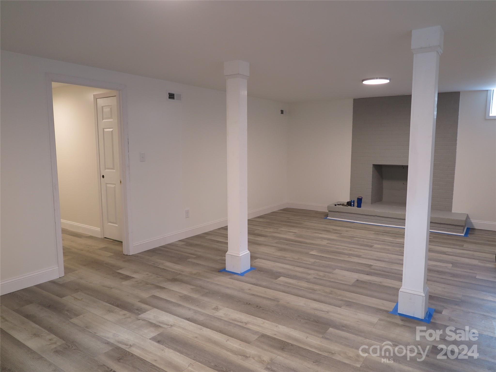 544 Loray Farm Road Dallas, NC 28034 - Photo 7 of 30 a view of a hallway with wooden floor