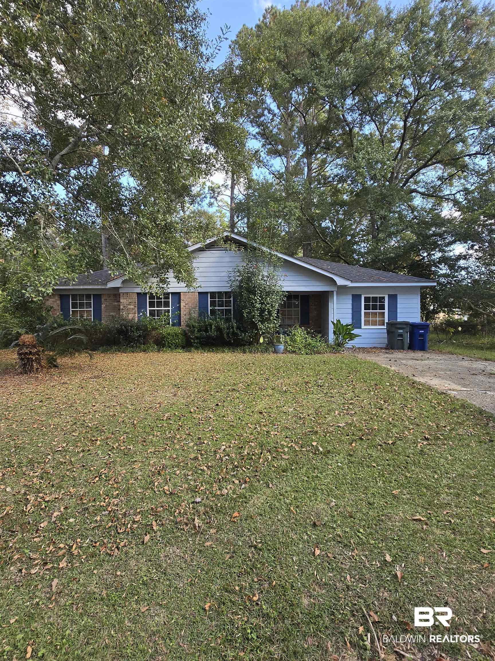 1820 North Cedar Street Foley, AL 36535 - Photo 1 of 14 Ranch-style house with a front lawn and brick siding