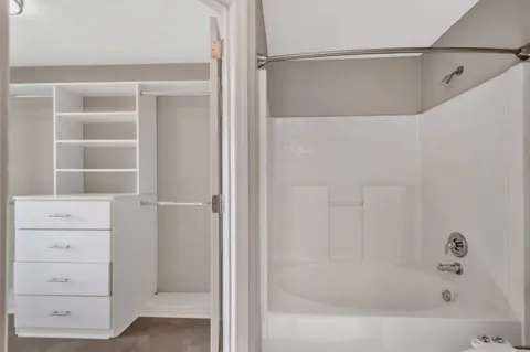 a bathroom with a bathtub