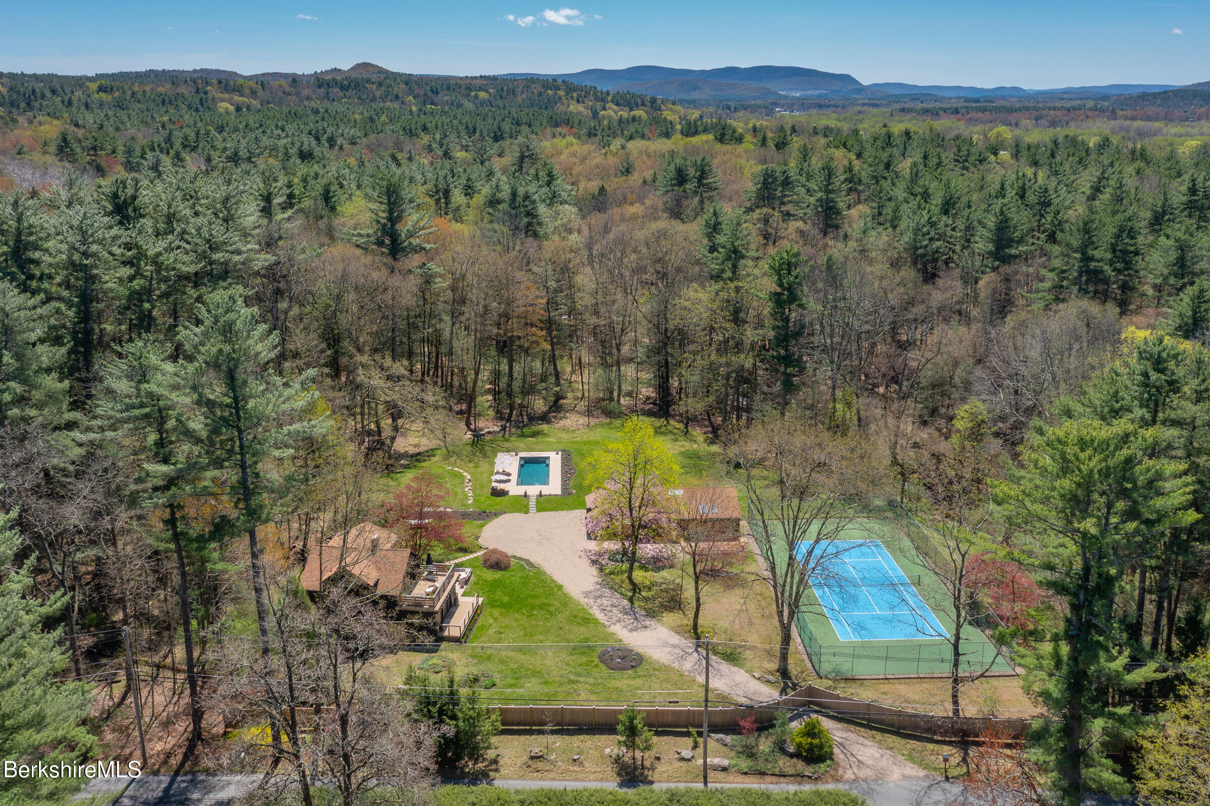 246 County Road Sheffield, MA 01257 - Photo 1 of 59 an aerial view of a house with a yard and lake view