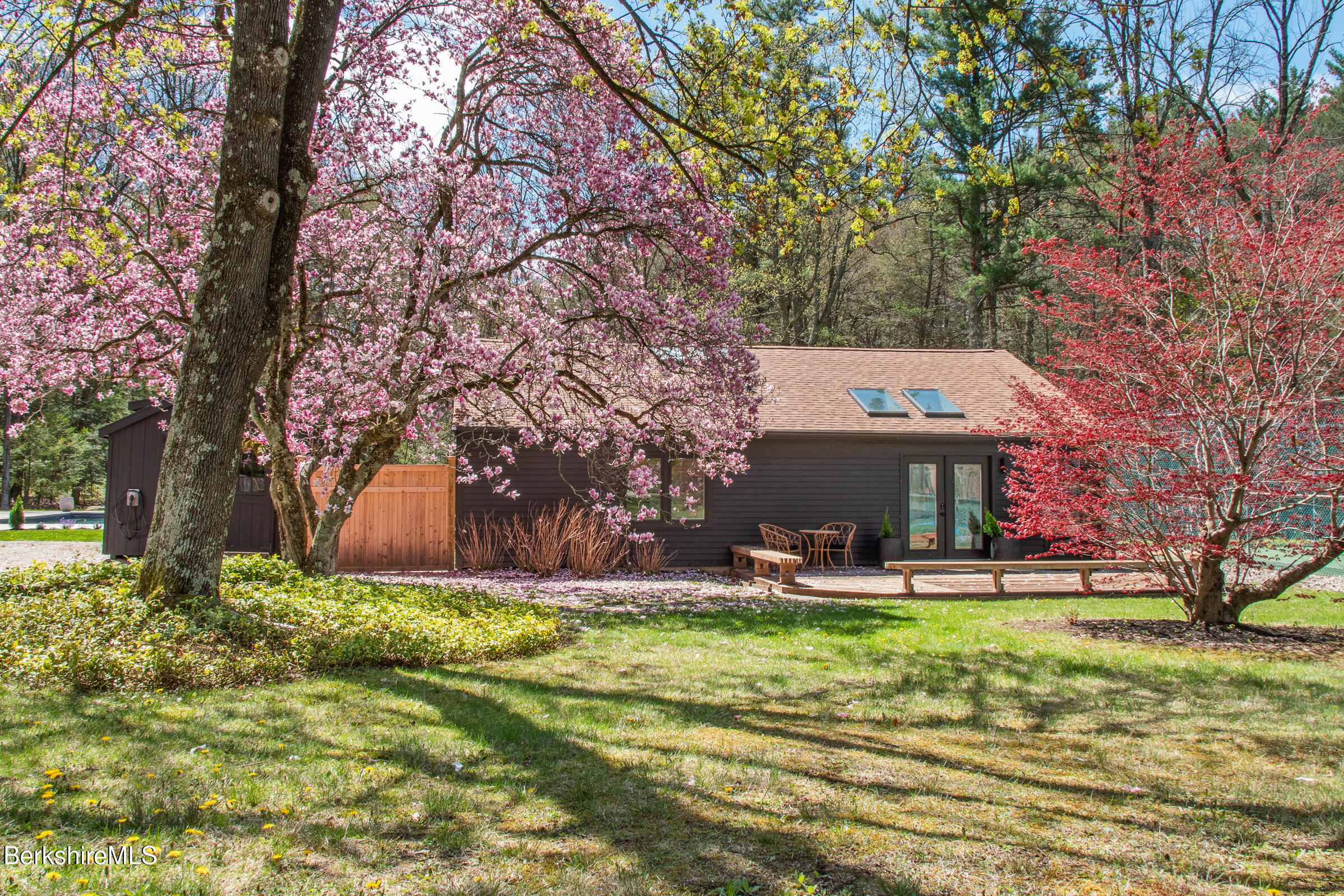 246 County Road Sheffield, MA 01257 - Photo 11 of 59 a view of a fountain in front of a house