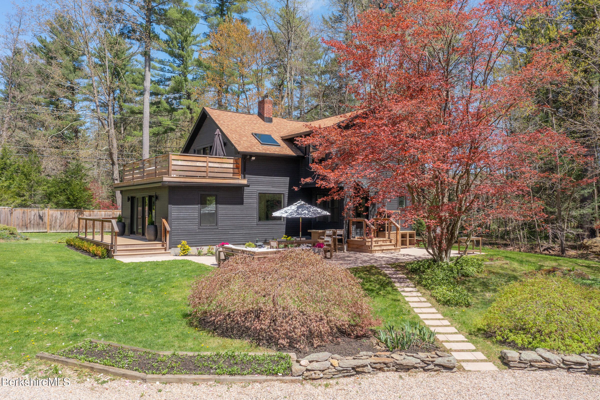 246 County Road Sheffield, MA 01257 - Photo 26 of 59 a view of a house with sitting area and garden