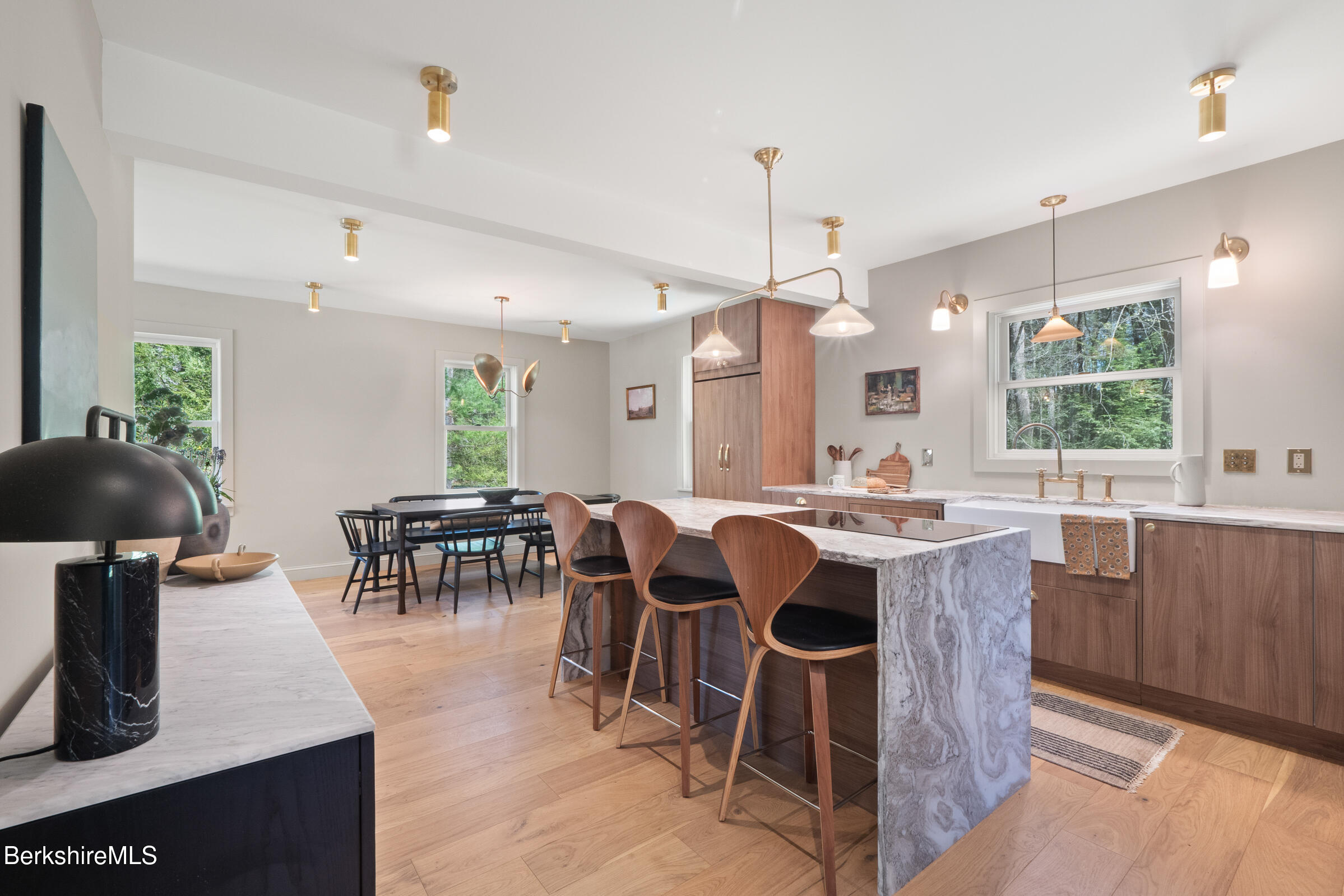 246 County Road Sheffield, MA 01257 - Photo 31 of 59 a view of kitchen with sink dining table and chairs