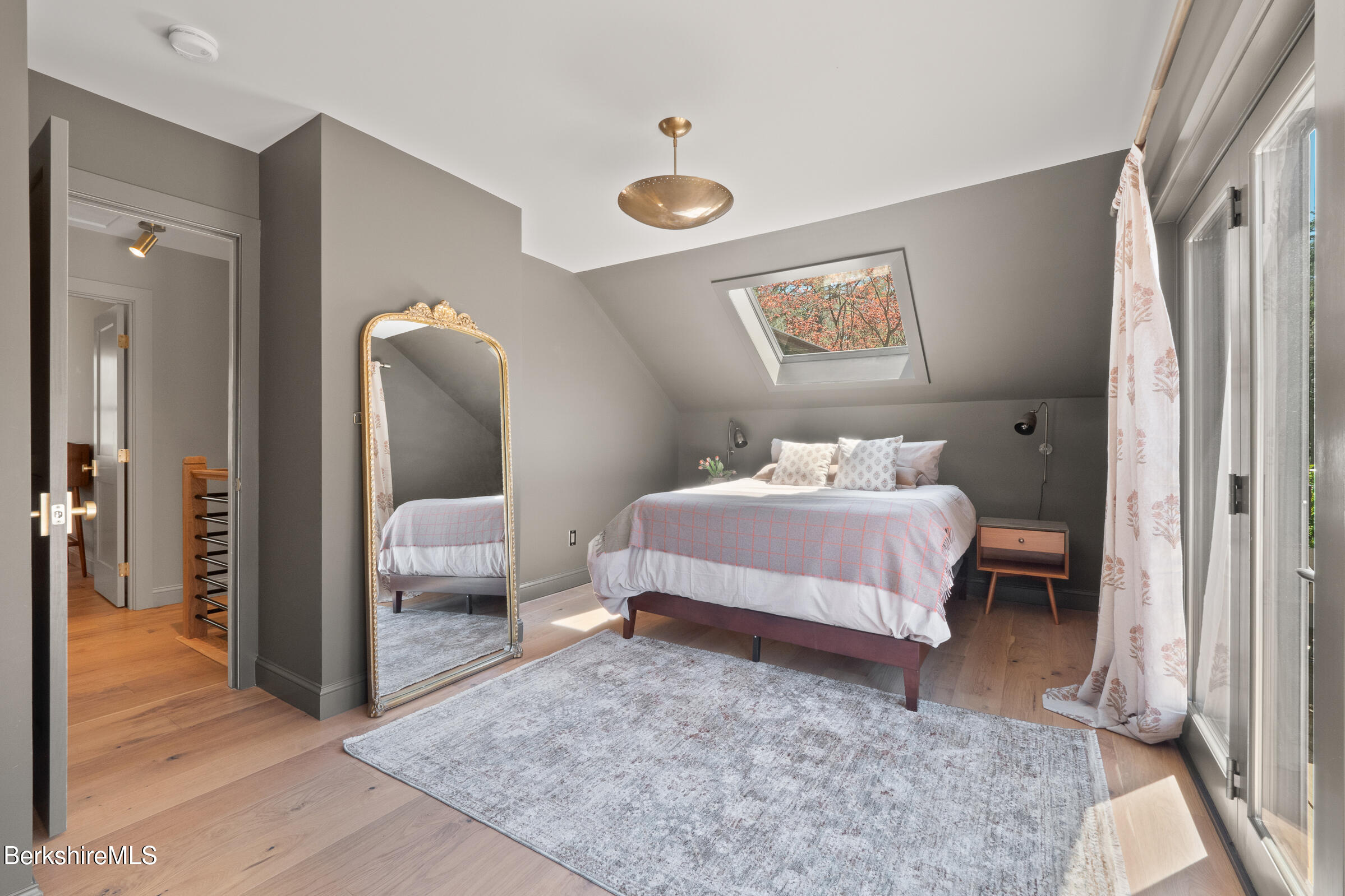 246 County Road Sheffield, MA 01257 - Photo 44 of 59 a bedroom with a bed and a painting on the wall