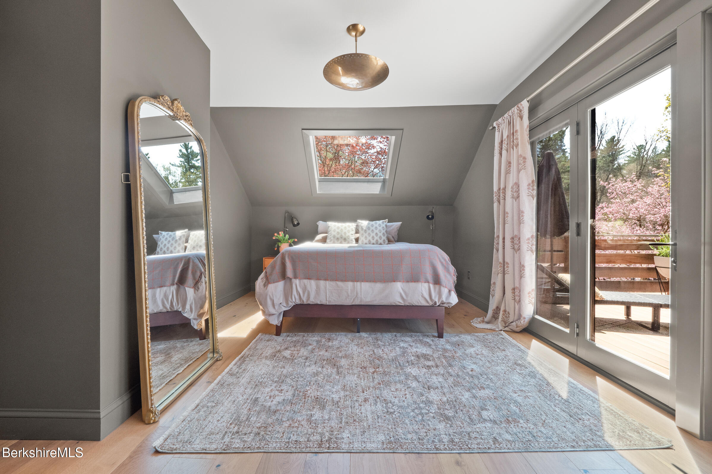 246 County Road Sheffield, MA 01257 - Photo 48 of 59 a bedroom with a bed and a large window