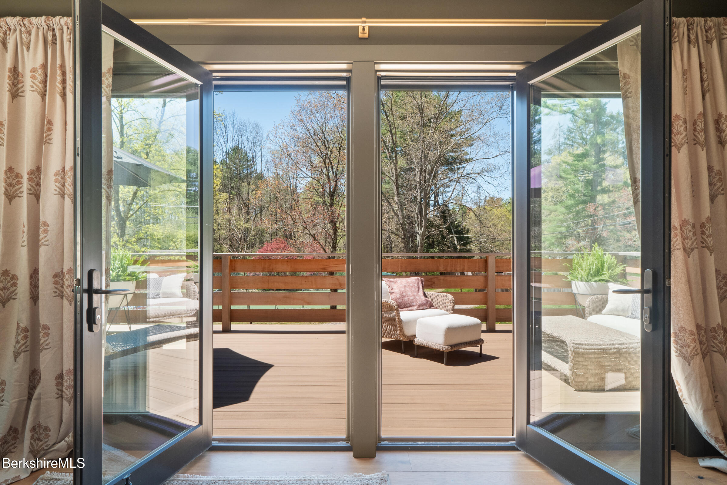 246 County Road Sheffield, MA 01257 - Photo 49 of 59 a room with wooden floor and outdoor view
