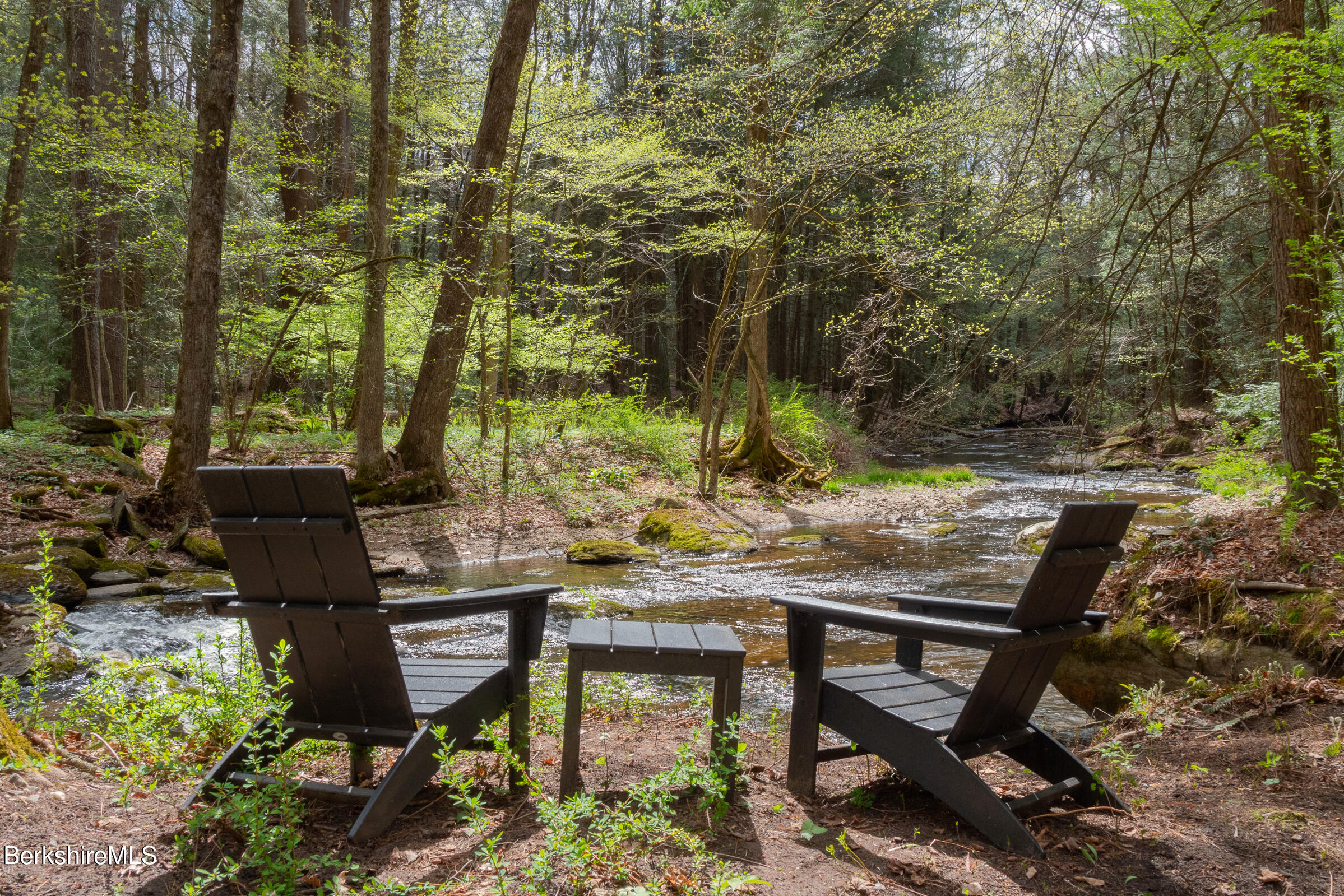 246 County Road Sheffield, MA 01257 - Photo 5 of 59 a backyard of a house with table and chairs
