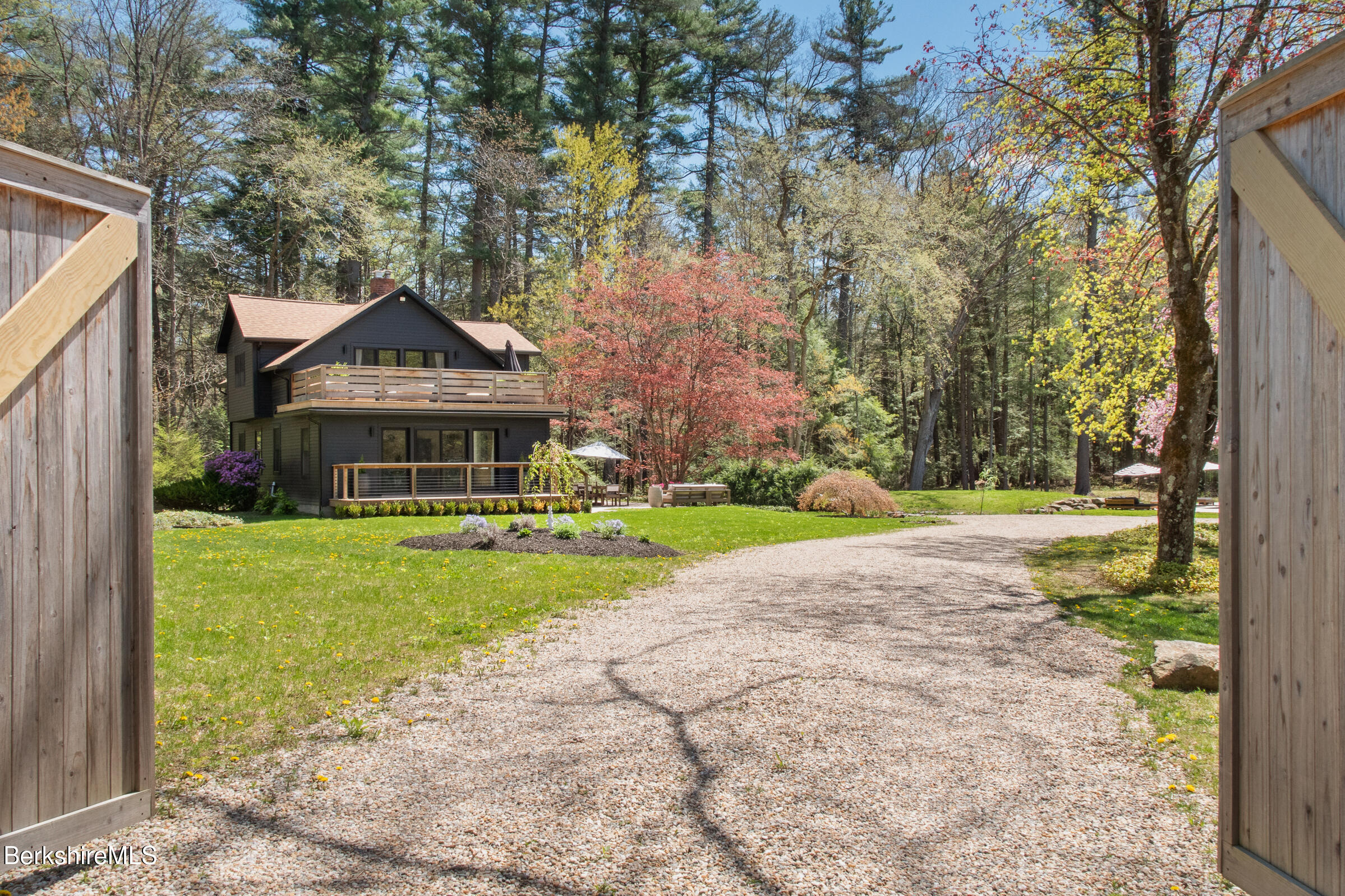 246 County Road Sheffield, MA 01257 - Photo 57 of 59 a front view of a house with a yard