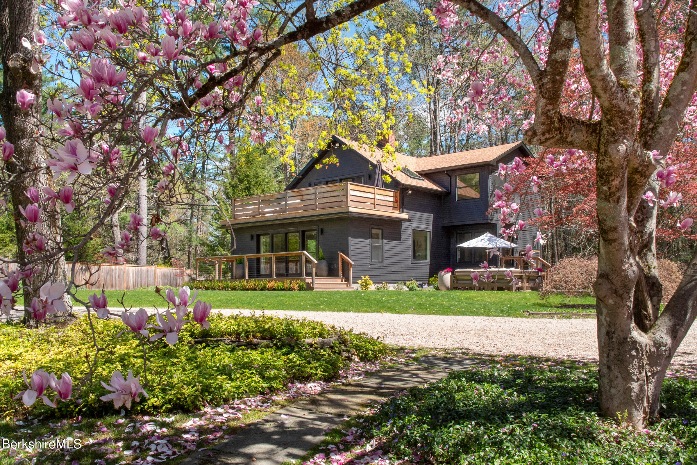 246 County Road Sheffield, MA 01257 - Photo 6 of 59 a front view of a house with a yard and a large tree