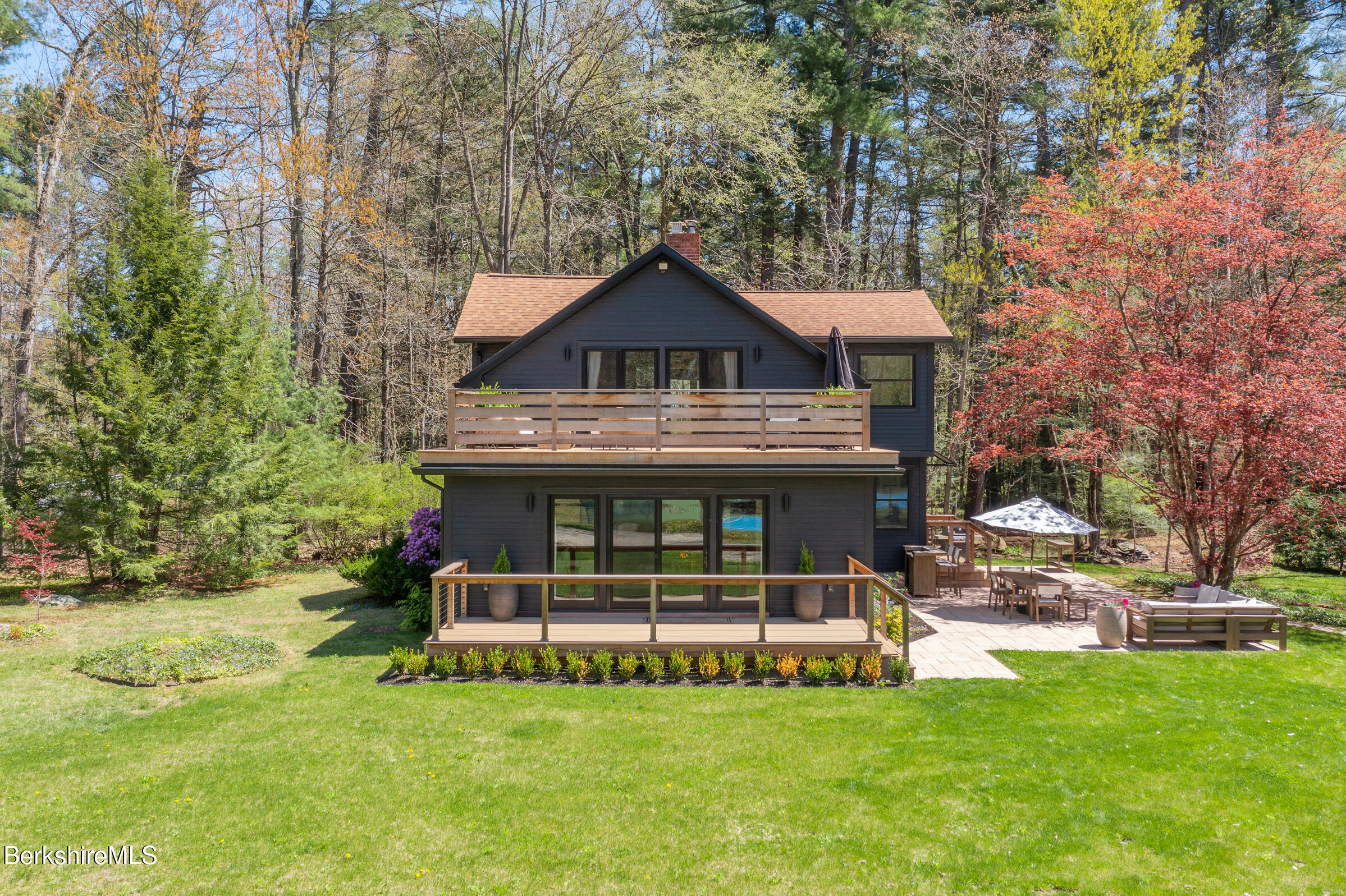 246 County Road Sheffield, MA 01257 - Photo 7 of 59 a view of a house with a yard porch and sitting area