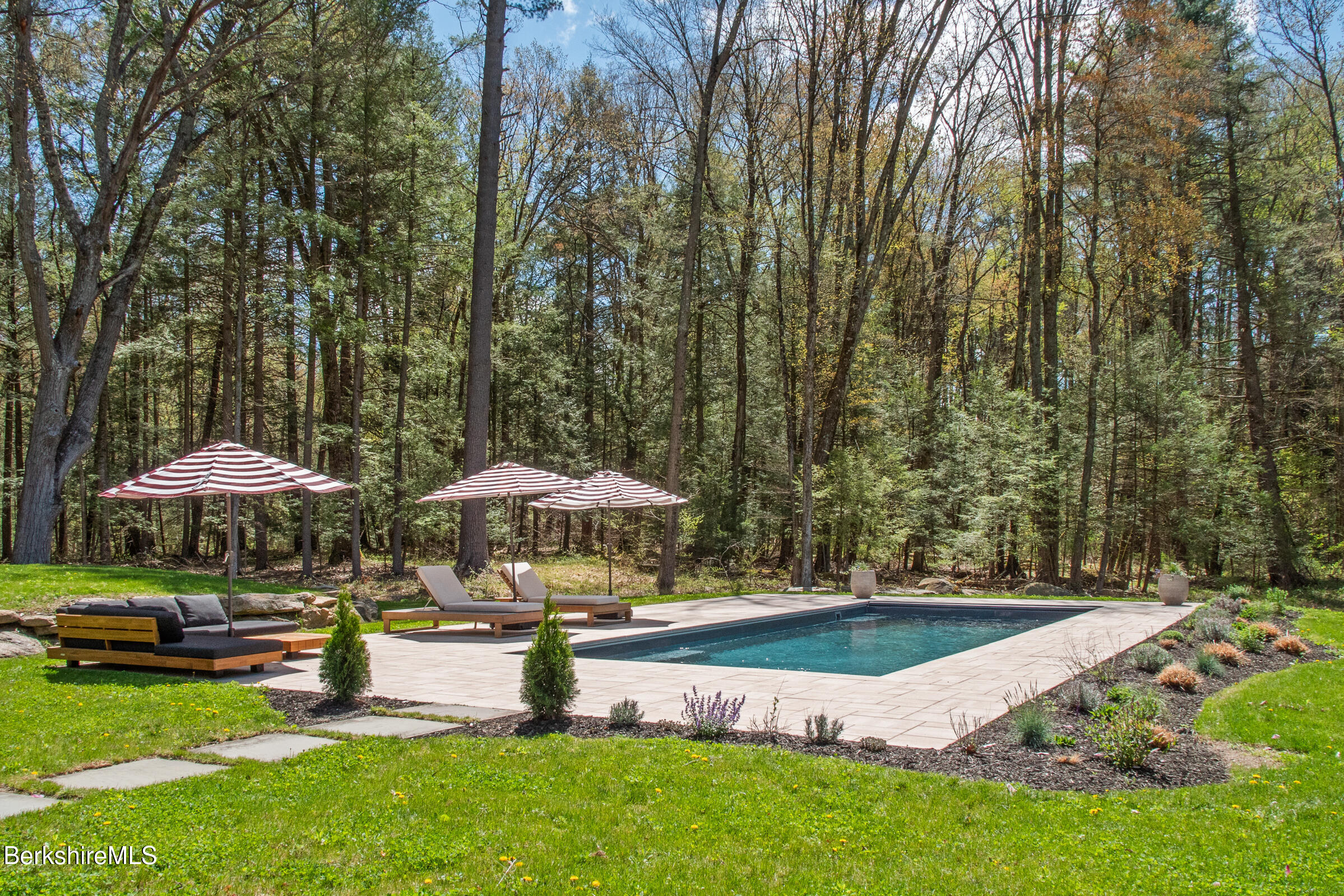 246 County Road Sheffield, MA 01257 - Photo 9 of 59 a swimming pool with outdoor seating and yard