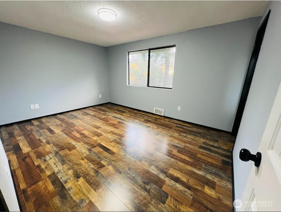 1412 Centralia Alpha Road Chehalis, WA 98532 - Photo 11 of 37 a view of an empty room with a window