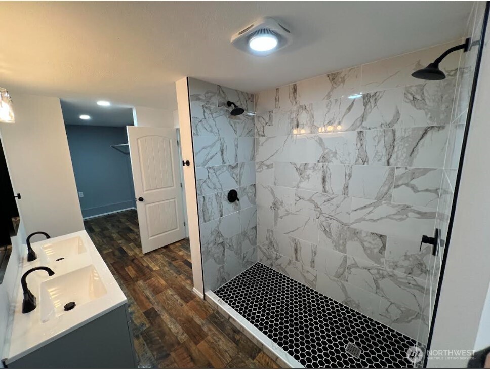 1412 Centralia Alpha Road Chehalis, WA 98532 - Photo 26 of 37 a bathroom with a sink a shower and toilet