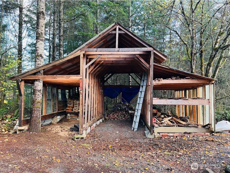 1412 Centralia Alpha Road Chehalis, WA 98532 - Photo 36 of 37 a front view of a house with a porch