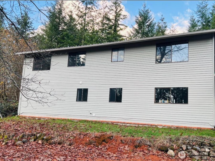 1412 Centralia Alpha Road Chehalis, WA 98532 - Photo 37 of 37 a view of a house with a yard