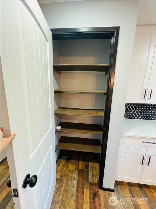 1412 Centralia Alpha Road Chehalis, WA 98532 - Photo 7 of 37 a view of walk in closet with empty racks