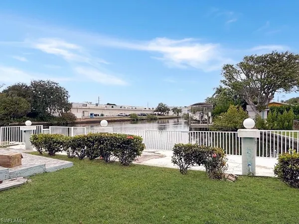 a garden view with a lake view
