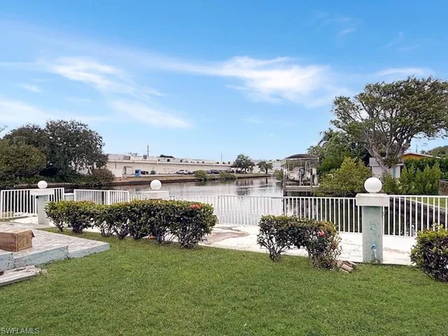 a garden view with a lake view