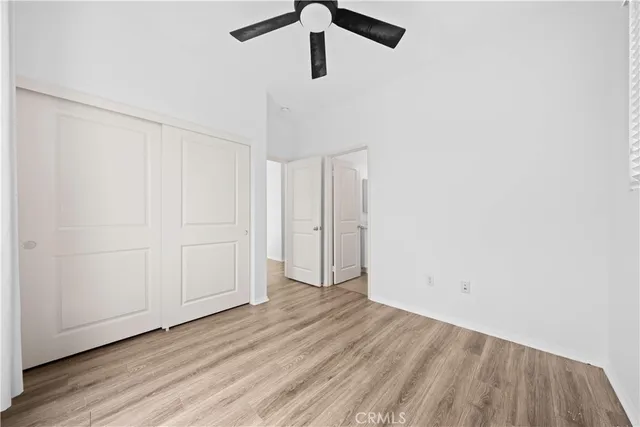 a view of a livingroom with wooden floor