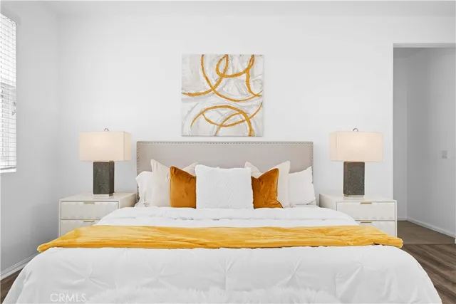 a bathroom with a granite countertop sink a mirror a shower and a bathtub