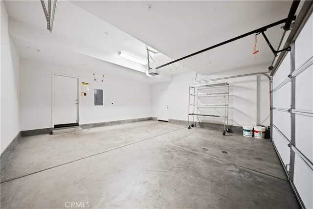 front view of a building with multiple cars