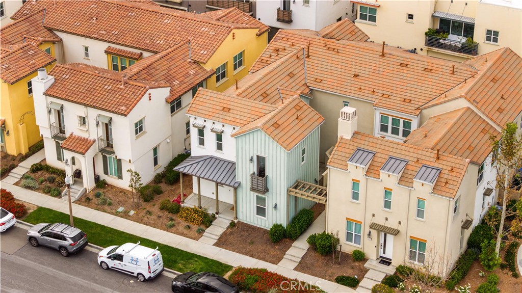 145 Mongoose Irvine, CA 92618 - Photo 35 of 37 front view of a building with multiple cars