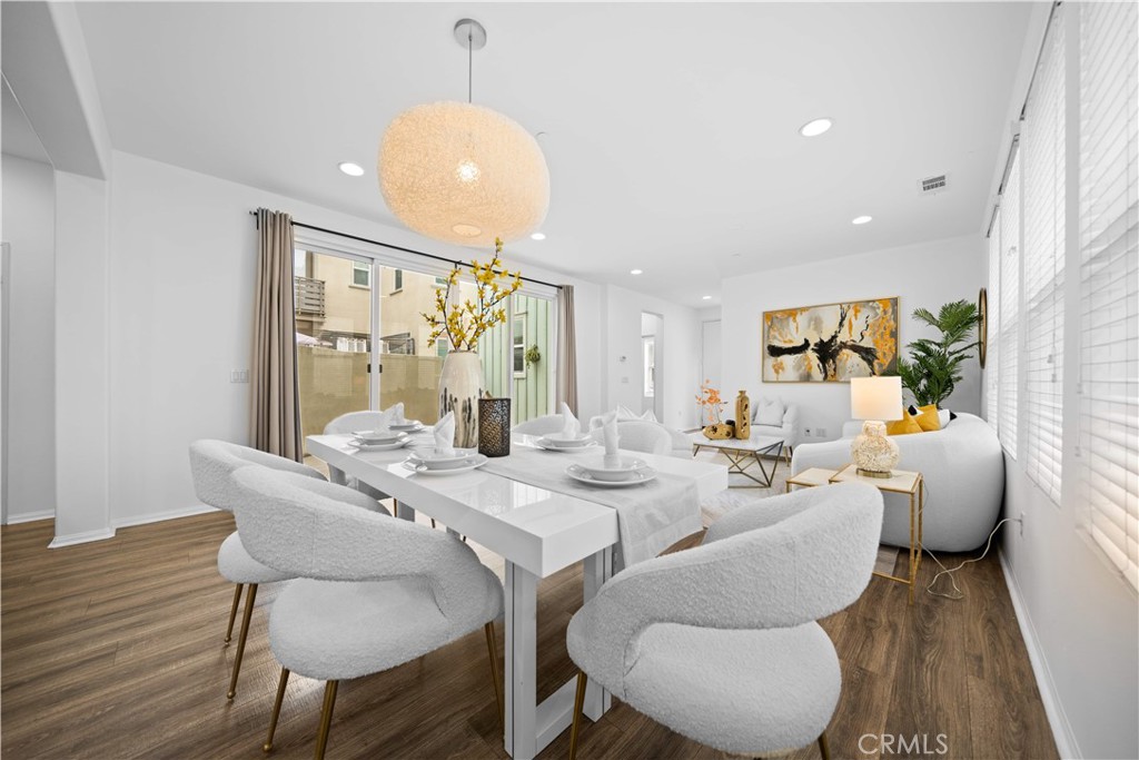 145 Mongoose Irvine, CA 92618 - Photo 10 of 37 a living room with furniture and a large window